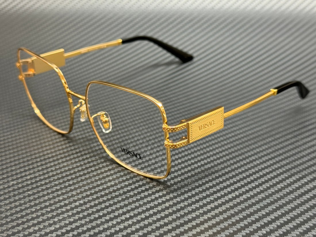 Versace VE1303D 1002 Gold Eyeglasses with Authenticity Certificate: Versace VE1303D 1002 Gold Eyeglasses with Authenticity Certificate Elevate your eyewear collection with these stunning Versace eyeglasses, model VE1303D 1002. Featuring a luxurious gold frame, these e