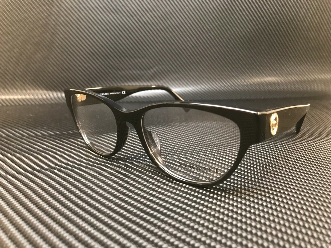 Versace VE3287A GB1 Black Women's Eyeglasses with Demo Lens: Versace VE3287A GB1 Black Women's Eyeglasses with Demo Lens Discover the elegance of Versace with these VE3287A GB1 women's eyeglasses, crafted in Italy. Featuring a sleek black frame, these eyeglasse