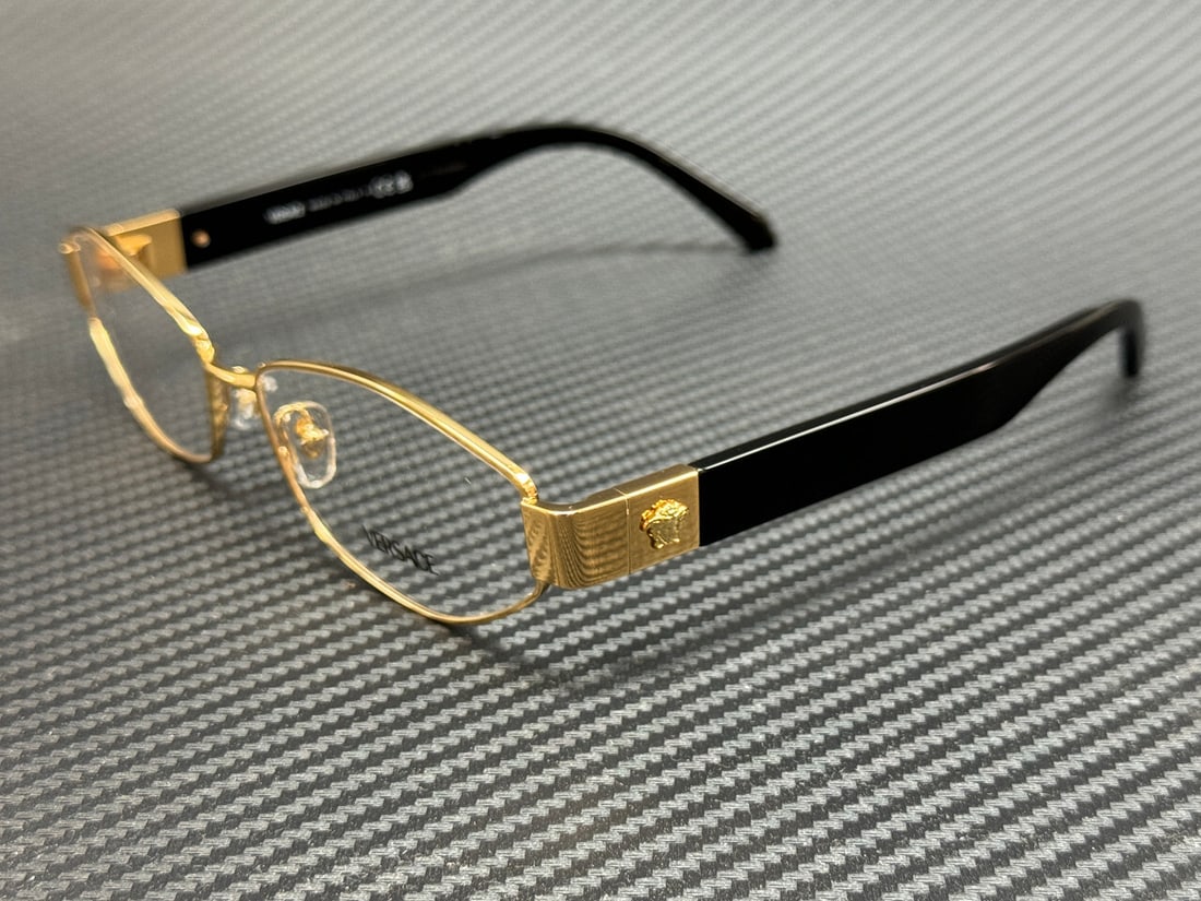 Versace VE1298 1002 Gold Black Women's Eyeglasses with Certificate of Authenticity: Versace VE1298 1002 Gold Black Women's Eyeglasses with Certificate of Authenticity Elevate your eyewear collection with these Versace VE1298 eyeglasses. Featuring a luxurious gold and black color sche