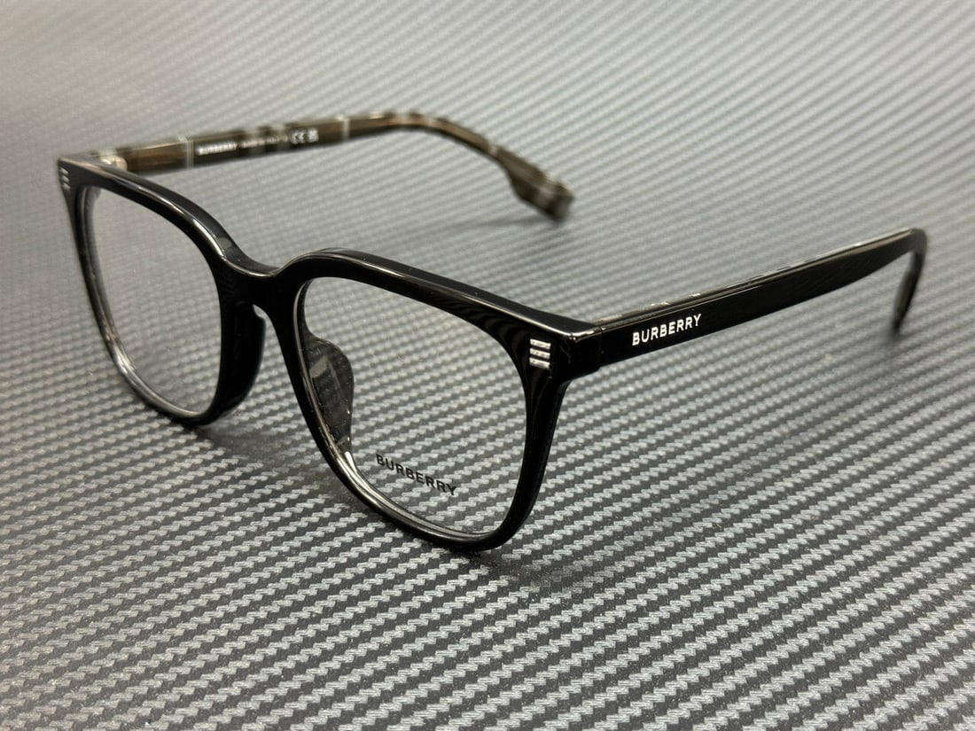 Burberry BE2361D 4101 Black Men's Eyeglasses with Authenticity Certificate: Burberry BE2361D 4101 Black Men's Eyeglasses with Authenticity Certificate Discover the elegance of Burberry with these stylish black eyeglasses, model BE2361D 4101. Designed for men, these eyeglasses