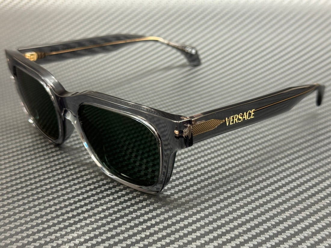 Versace VE4486 551071 Transparent Grey Green 52mm Sunglasses with Box and Certificate: Versace VE4486 551071 Transparent Grey Green 52mm Sunglasses with Box and Certificate Elevate your style with these Versace VE4486 sunglasses, designed for men. Featuring a sleek transparent grey fram