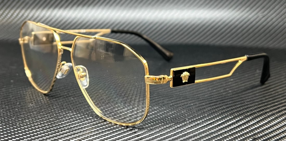 Versace VE1287 1002 Shiny Gold Men's Eyeglasses with Authenticity Certificate: Versace VE1287 1002 Shiny Gold Men's Eyeglasses with Authenticity Certificate Introducing the Versace VE1287 1002 Shiny Gold Men's Eyeglasses, a perfect blend of luxury and style. These eyeglasses fea