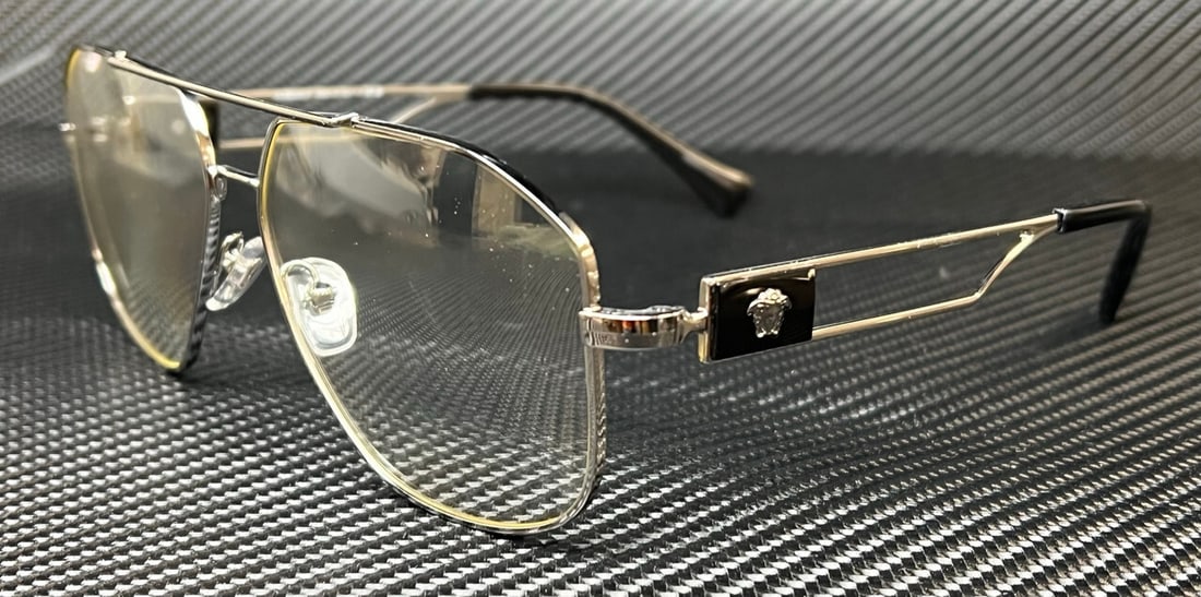 Versace VE1287 1001 Gunmetal Men's Eyeglasses with Authenticity Certificate: Versace VE1287 1001 Gunmetal Men's Eyeglasses with Authenticity Certificate Discover the elegance of Versace with these VE1287 1001 Gunmetal Men's Eyeglasses. Crafted with a sophisticated gunmetal fra