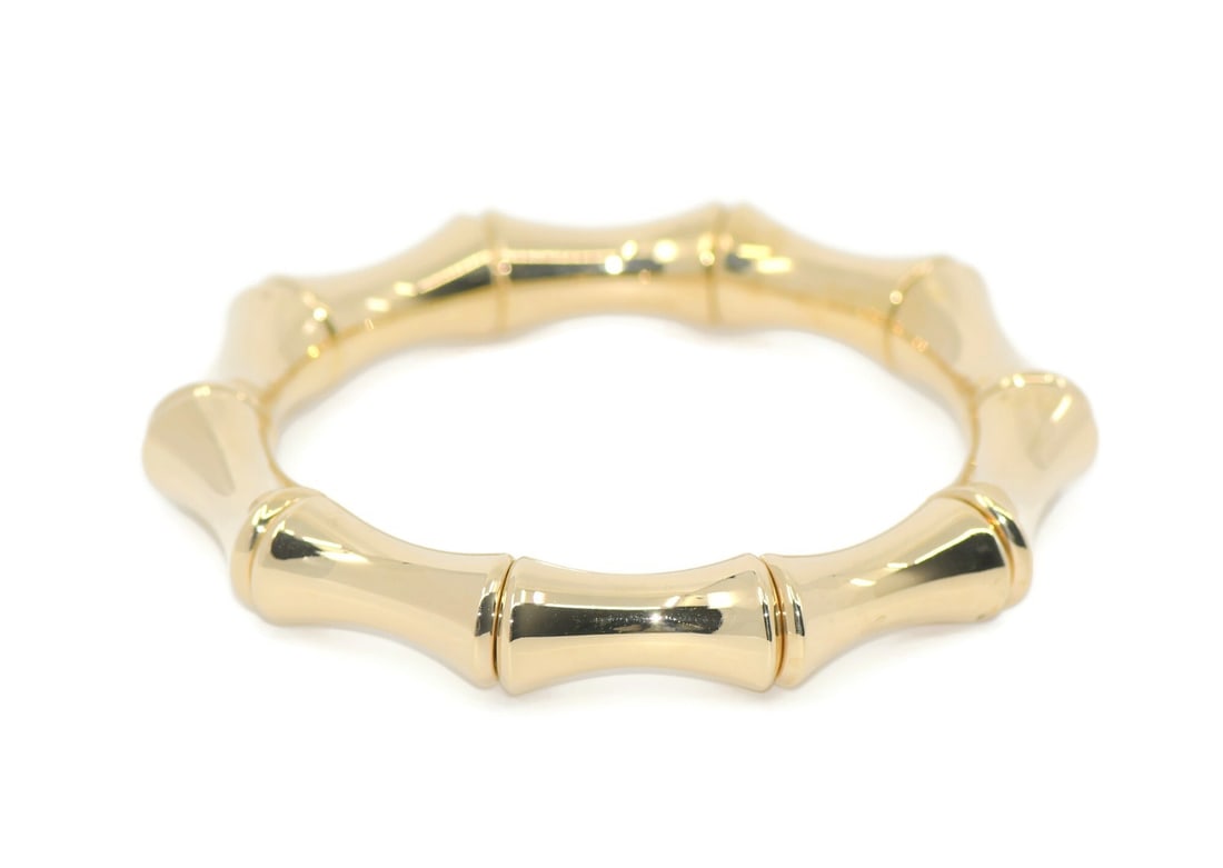 Gucci Bamboo Stretch 18K Yellow Gold Bangle Bracelet 7 Inch Authentic: Gucci Bamboo Stretch 18K Yellow Gold Bangle Bracelet 7 Inch Authentic Elevate your accessory collection with this stunning Gucci Bamboo Stretch bracelet. Crafted from 18K yellow gold, this bangle-styl