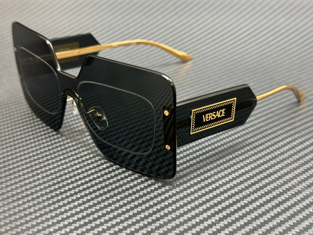 Versace VE2277 100287 Grey Gold Women's Sunglasses with Authenticity: Versace VE2277 100287 Grey Gold Women's Sunglasses with Authenticity Elevate your style with these stunning Versace VE2277 sunglasses, featuring a luxurious grey gold frame that beautifully complement