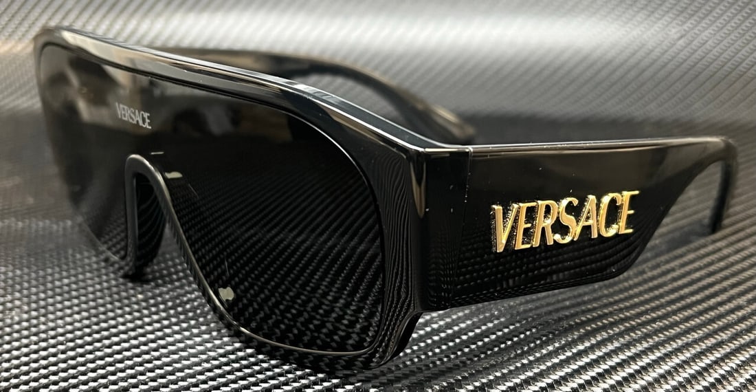 Versace VE4439 GB1 87 Women's Black Dark Grey Sunglasses with Authenticity Certificate: Versace VE4439 GB1 87 Women's Black Dark Grey Sunglasses with Authenticity Certificate Elevate your style with these VERSACE VE4439 GB1 87 Sunglasses. Featuring a sophisticated black frame and dark gr