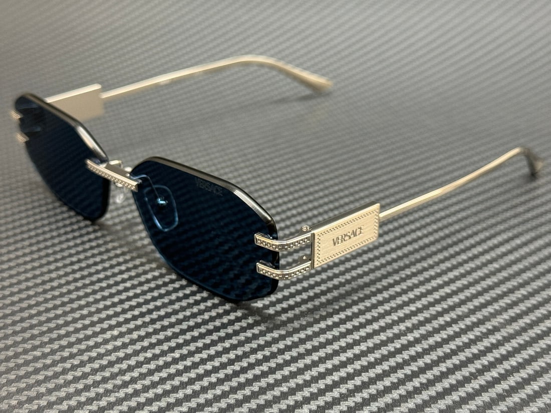 Versace VE2274 100080 Silver Blue Women's Sunglasses 58mm: Versace VE2274 100080 Silver Blue Women's Sunglasses 58mm Experience luxury and style with these VERSACE VE2274 100080 sunglasses. Designed for women, these sunglasses feature an elegant silver frame