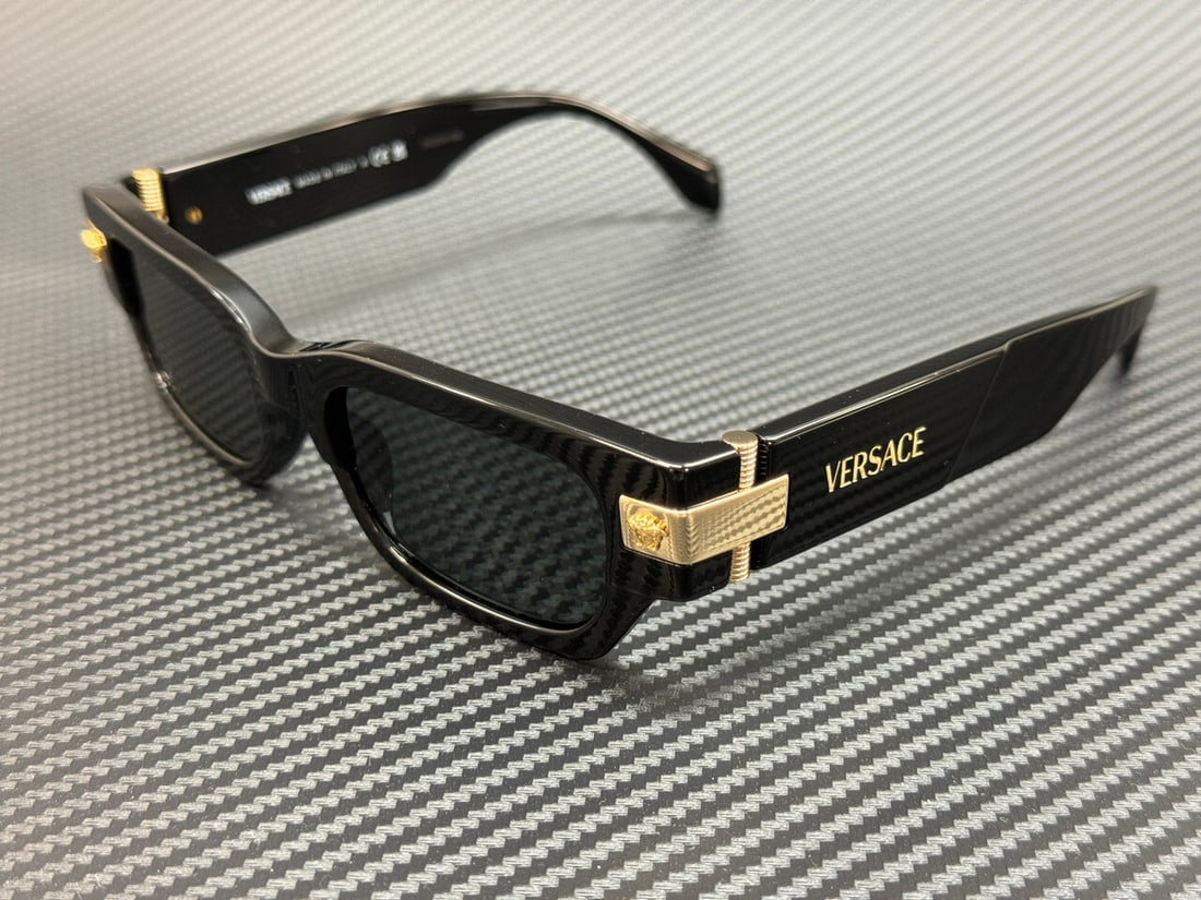Versace VE4465 GB1 87 Black Grey 53mm Men's Sunglasses with Authenticity Certificate: Versace VE4465 GB1 87 Black Grey 53mm Men's Sunglasses with Authenticity Certificate Elevate your style with these Versace VE4465 GB1 87 sunglasses, designed for men. Featuring a sleek black frame com