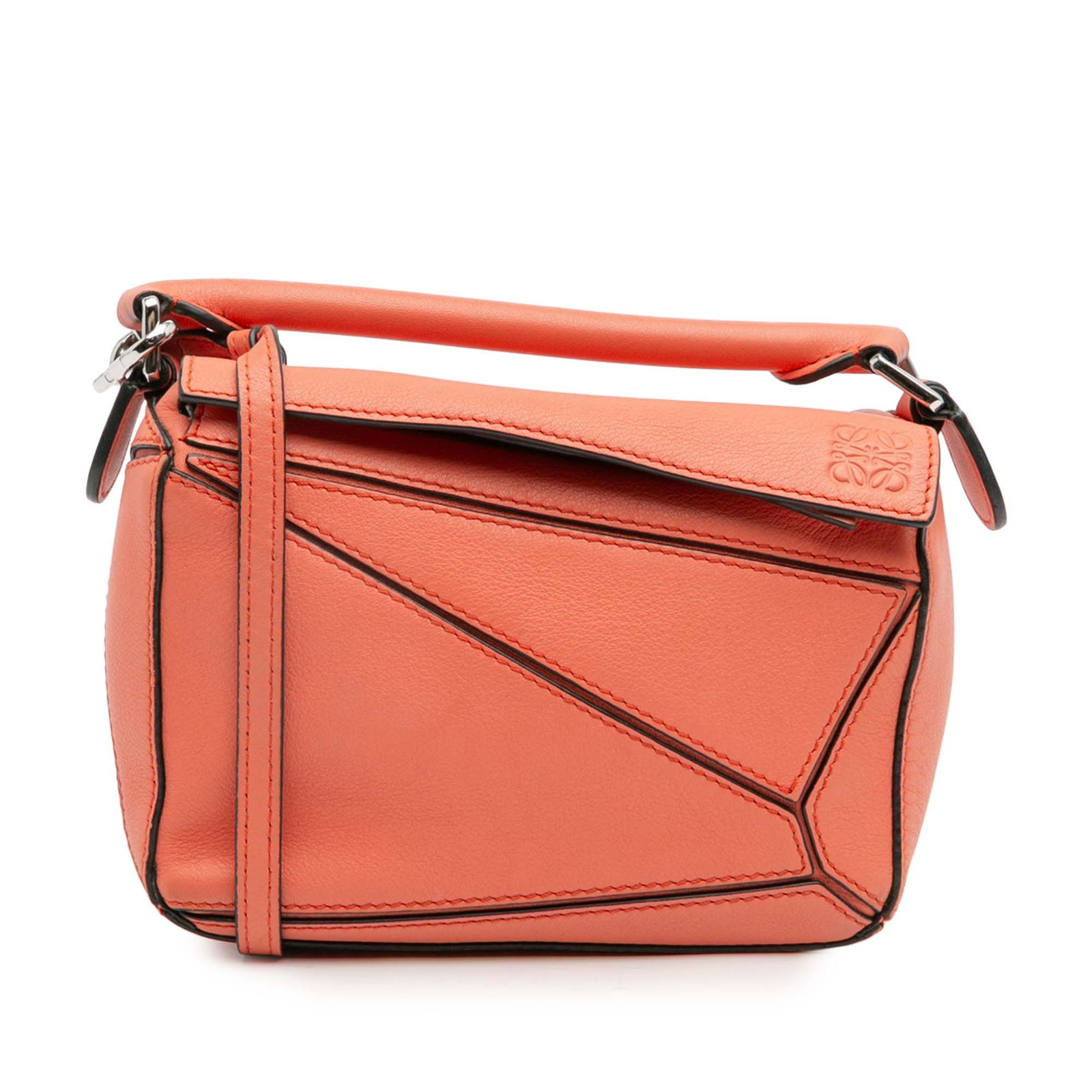 LOEWE Mini Calfskin Puzzle Satchel Orange Leather Bag: LOEWE Mini Calfskin Puzzle Satchel Orange Leather Bag The LOEWE Mini Calfskin Puzzle Satchel is an exquisite accessory crafted from high-quality leather. It features a stylish rolled leather top handl