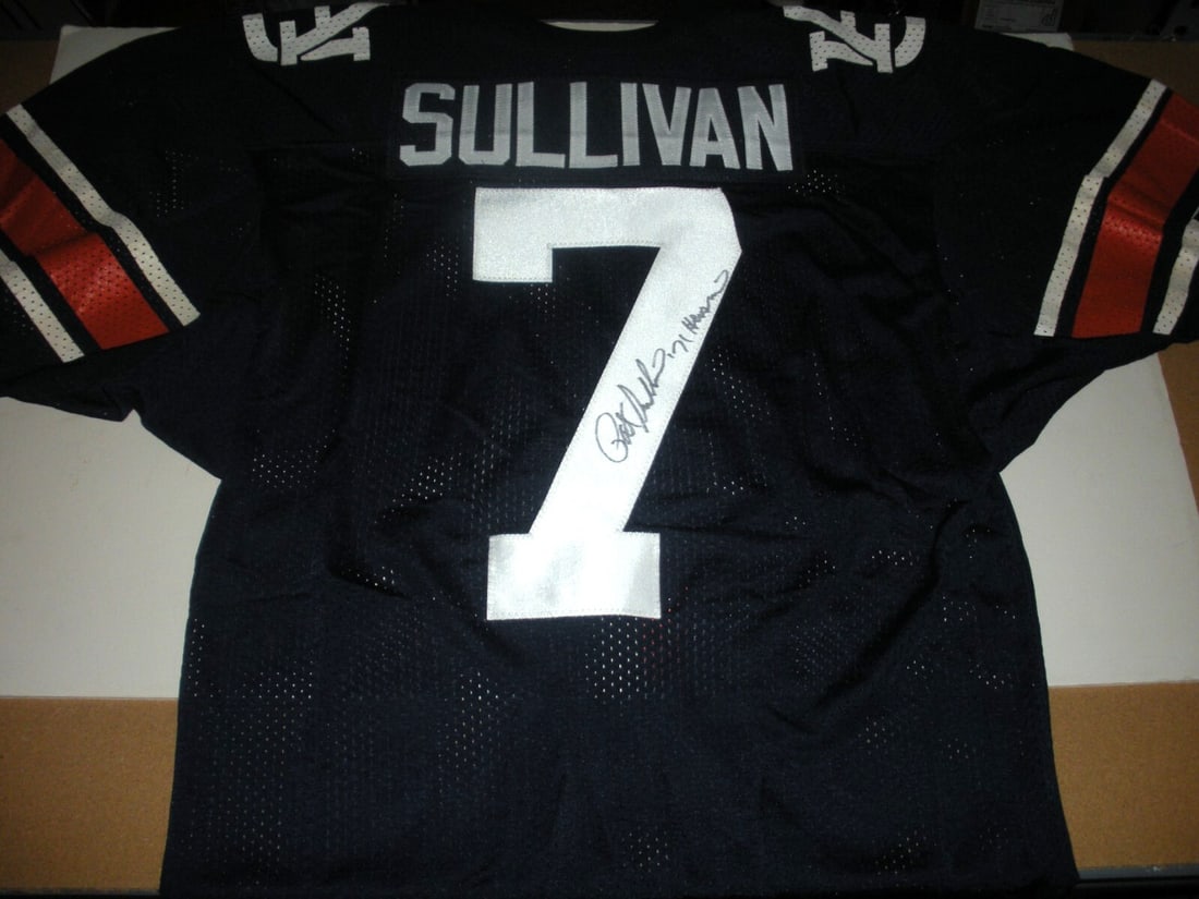 Pat Sullivan Signed Auburn Tigers Jersey with COA: Pat Sullivan Signed Auburn Tigers Jersey with COA This officially licensed Auburn Tigers athletic jersey, signed by Pat Sullivan, is a must-have for any football fan. As an original piece, it comes wi