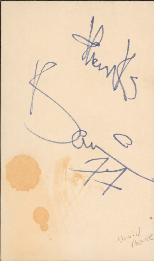 David Bowie Signed 3x5 Index Card Thanks 77 BAS Authenticated: David Bowie Signed 3x5 Index Card Thanks 77 BAS Authenticated This is an authentic signed 3x5 index card featuring a personal inscription of "Thanks 77" by the legendary David Bowie. The card comes wi