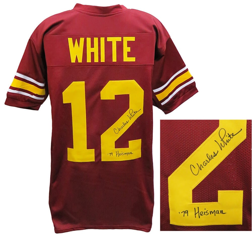 Charles White USC Trojans Signed Red Jersey with 79 Heisman Inscription: Charles White USC Trojans Signed Red Jersey with 79 Heisman Inscription This is a red throwback custom football jersey signed by Charles White, featuring the inscription '79 Heisman'. It is an origina