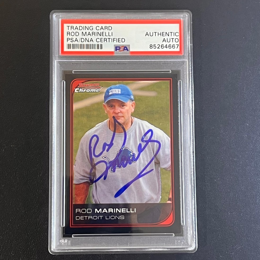 2006-07 Topps Bowman Chrome #165 Rod Marinelli Autographed PSA/DNA Certified Card: 2006-07 Topps Bowman Chrome #165 Rod Marinelli Autographed PSA/DNA Certified Card This is a 2006-07 Topps Bowman Chrome #165 trading card, signed by Coach Rod Marinelli. The card features an authentic