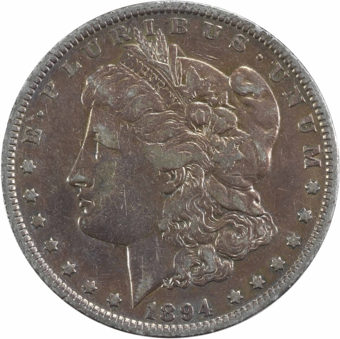 1894 Morgan Silver Dollar VF Uncertified 90% Silver Coin: 1894 Morgan Silver Dollar VF Uncertified 90% Silver Coin This 1894 Morgan Silver Dollar is a beautifully circulated coin, featuring a striking design by George T. Morgan. With a composition of 90% sil