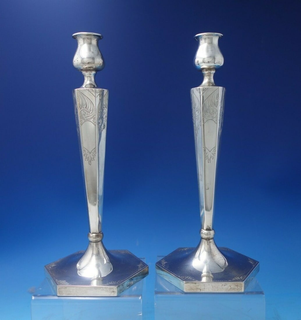 AC Sterling Silver Bright-Cut Candlestick Pair 12" Tall 13.4 ozt: AC Sterling Silver Bright-Cut Candlestick Pair 12" Tall 13.4 ozt This exquisite pair of bright-cut candlesticks is crafted from sterling silver by AC. Each candlestick stands at 12 inches tall and has
