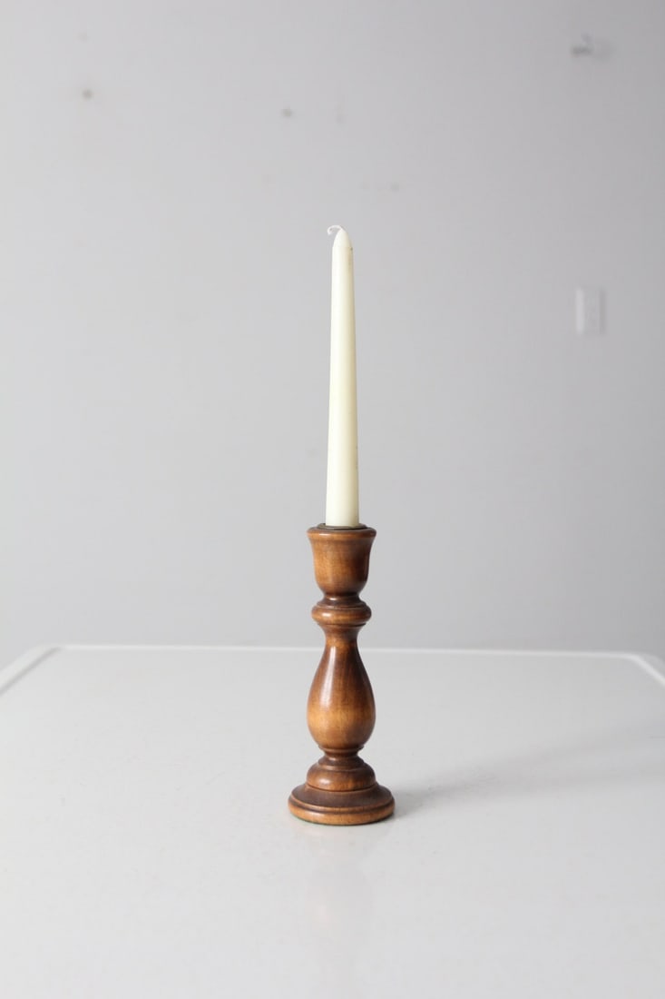 Vintage Turned Wood Candlestick Holder with Brass Sockets: Vintage Turned Wood Candlestick Holder with Brass Sockets This vintage turned wood candlestick holder brings a touch of classic elegance to any space. Crafted from quality wood, it features brass cand