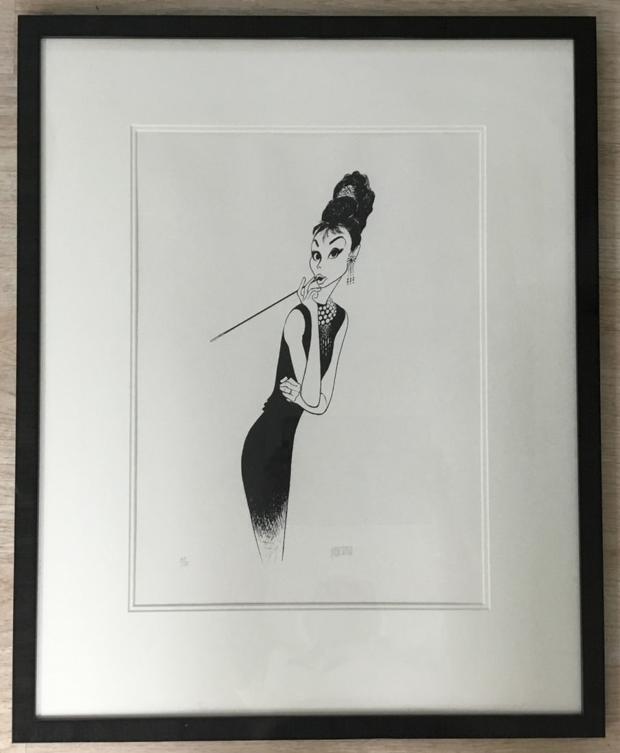 Al Hirschfeld Audrey Hepburn Limited Edition Signed Lithograph Framed: Al Hirschfeld Audrey Hepburn Limited Edition Signed Lithograph Framed This exquisite lithograph by Al Hirschfeld features the iconic Audrey Hepburn in a portrayal inspired by her role in 'Breakfast at