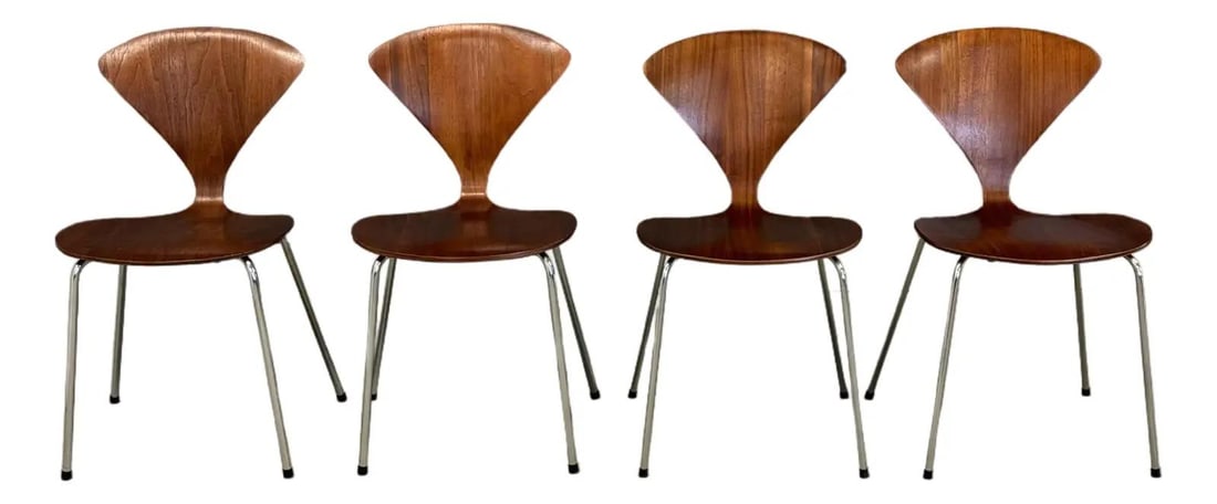 Mid Century Modern Norman Cherner Dining Chairs Set of 4: Mid Century Modern Norman Cherner Dining Chairs Set of 4 This set of four mid-century modern dining chairs features a stylish bent walnut plywood design, complemented by sturdy steel rod legs. Attribu