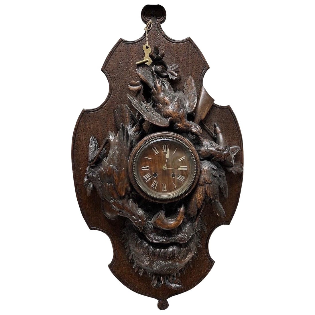 Monumental Mid-19th Century Black Forest Wall Clock with Intricate Carvings: Monumental Mid-19th Century Black Forest Wall Clock with Intricate Carvings This monumental 19th-century Black Forest carved wall clock is a stunning example of craftsmanship from the mid-1800s. With