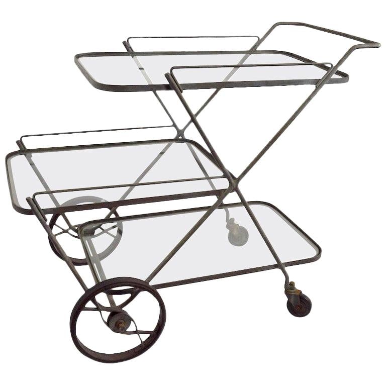Rare Tempestini Salterini Style Wrought Iron Bar Cart with Glass Shelves: Rare Tempestini Salterini Style Wrought Iron Bar Cart with Glass Shelves Discover this rare Salterini style serving bar cart featuring an original faux Verdigris finish. Crafted from wrought iron, thi