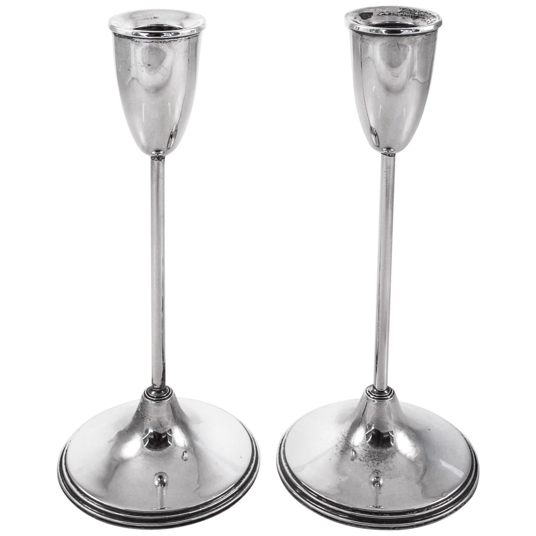 Mid-Century Modern Sterling Silver Candlesticks Set of 2 1966: Mid-Century Modern Sterling Silver Candlesticks Set of 2 1966 This stylish set of two sterling silver candlesticks combines a casual yet chic aesthetic, perfect for modern decor. With a height of 8.5