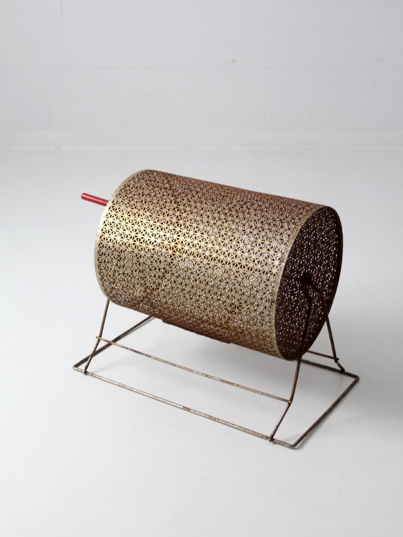 Unique Vintage Raffle Drum with Red Handle and Gold-Tone Barrel: Unique Vintage Raffle Drum with Red Handle and Gold-Tone Barrel Add a touch of nostalgia to your next event with this unique vintage raffle drum. Designed with a classic red handle and an aged gold-to