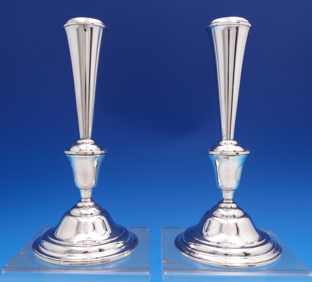 Rogers Sterling Silver Weighted Candlestick Pair 9 inch #210 65/17: Rogers Sterling Silver Weighted Candlestick Pair 9 inch #210 65/17 This exquisite pair of Rogers sterling silver candlesticks adds a touch of elegance to any setting. Standing at 9 inches tall with a