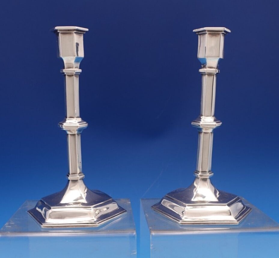 Victorian Sterling Silver Candlestick Pair by William Hutton & Sons: Victorian Sterling Silver Candlestick Pair by William Hutton & Sons This exquisite pair of English Victorian candlesticks, crafted by William Hutton & Sons, showcases the elegance of the 19th century.