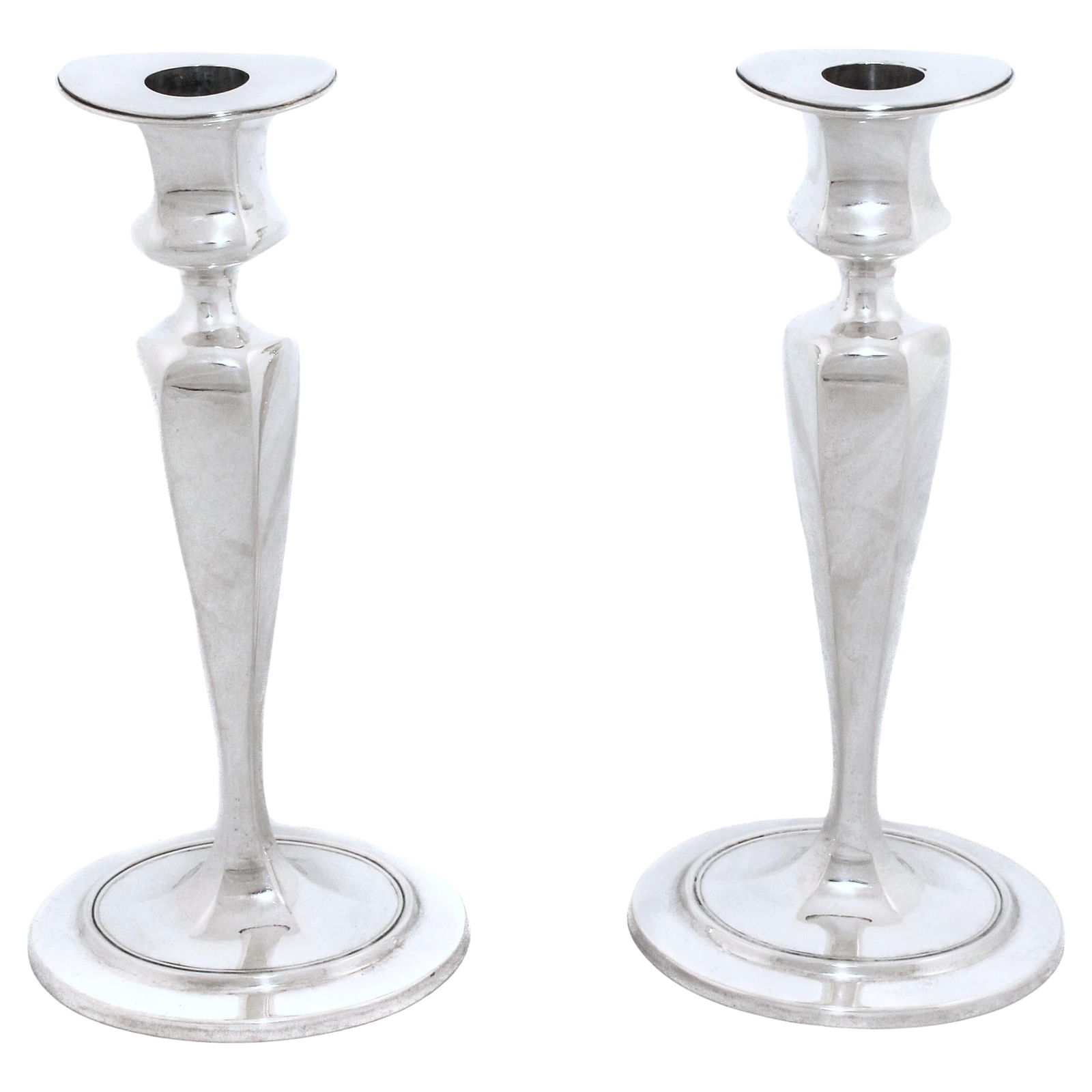 Tiffany & Co Sterling Silver Mid-Century Candlesticks Set of 2: Tiffany & Co Sterling Silver Mid-Century Candlesticks Set of 2 Enhance your home decor with this exquisite pair of Mid-Century candlesticks by Tiffany & Co. Crafted from sterling silver, these candles