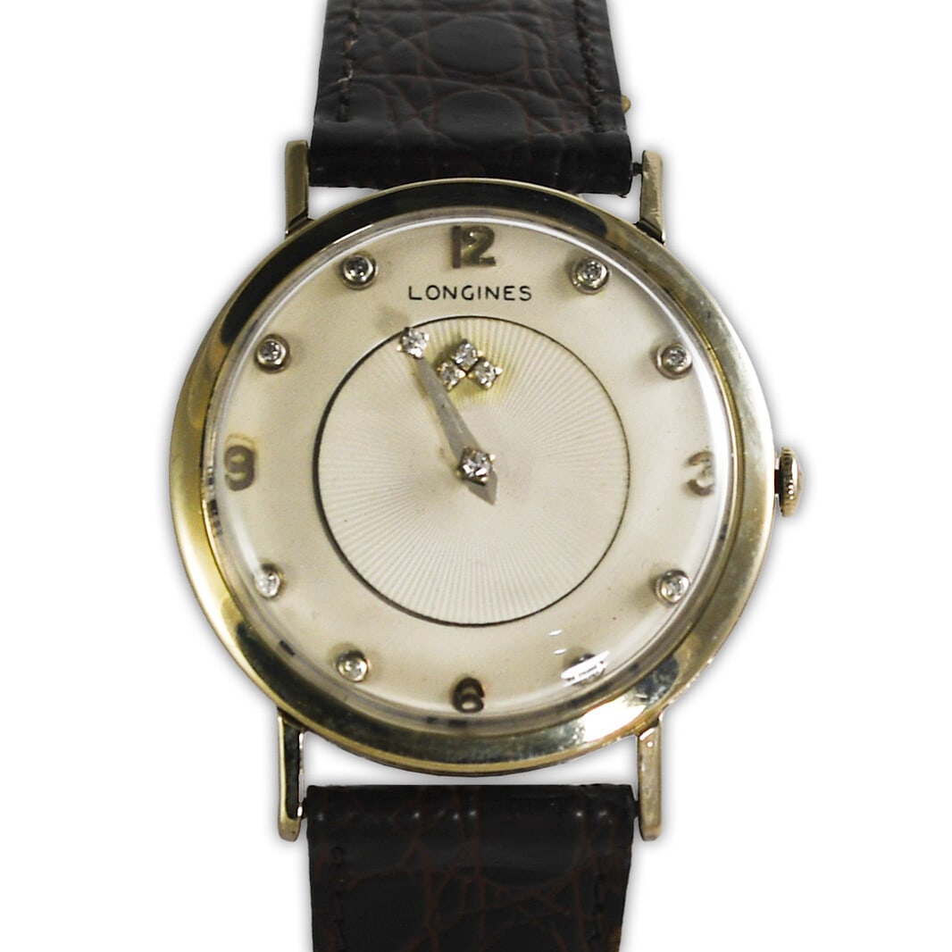 Vintage Longines 14K White Gold Diamond Dial Men's Watch: Vintage Longines 14K White Gold Diamond Dial Men's Watch Discover the elegance of the Vintage Longines Diamond Dial Watch, a timeless piece crafted from 14K white gold. This classic wristwatch feature