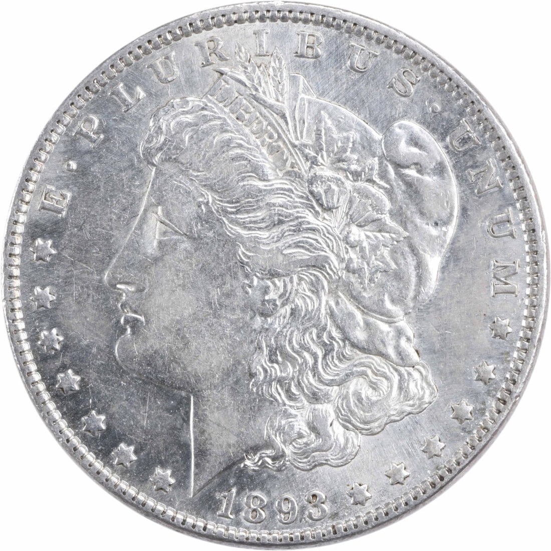1893 Morgan Silver Dollar AU Uncertified 90% Silver Coin: 1893 Morgan Silver Dollar AU Uncertified 90% Silver Coin This 1893 Morgan Silver Dollar showcases a grade of AU (Almost Uncirculated) and is a remarkable piece of American numismatic history. Struck i
