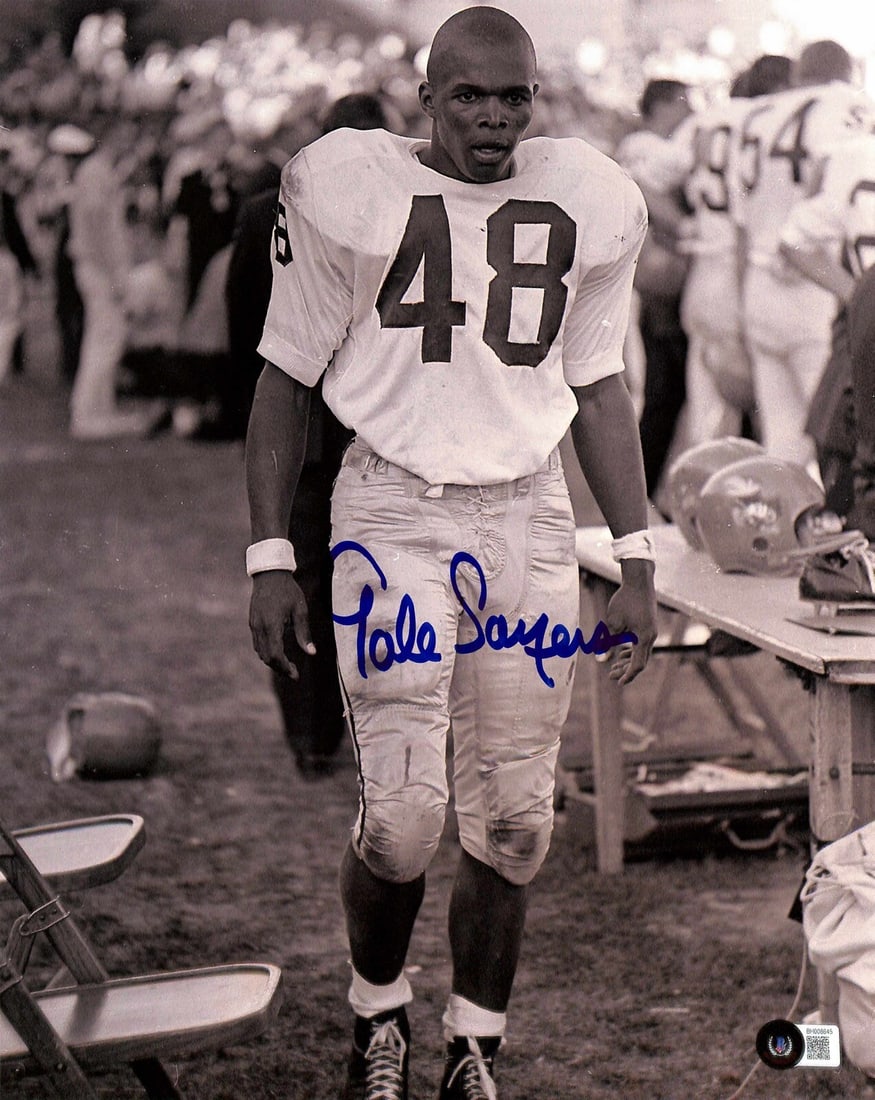 Gale Sayers Autographed 11x14 Photo Beckett Certified: Gale Sayers Autographed 11x14 Photo Beckett Certified This is an original 11x14 photograph of Gale Sayers, a legendary University of Kansas football player, signed in blue permanent marker. The autogr