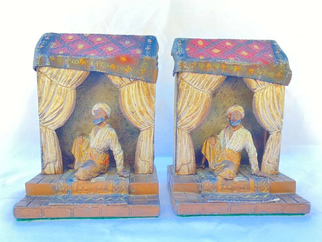 Exquisite 1900 Austrian Orientalism Metal Bookends Pair: Exquisite 1900 Austrian Orientalism Metal Bookends Pair This exquisite pair of 1900 Austrian orientalism metal bookends showcases remarkable detail, design, and craftsmanship. Each bookend measures 4.