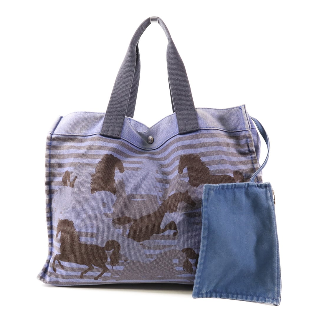 HERMES Blue Canvas Tote Handbag with PHW Frame: HERMES Blue Canvas Tote Handbag with PHW Frame Elevate your style with this HERMES Tote Bag, an elegant accessory crafted from durable canvas in a stunning blue hue. This handbag showcases a spacious 