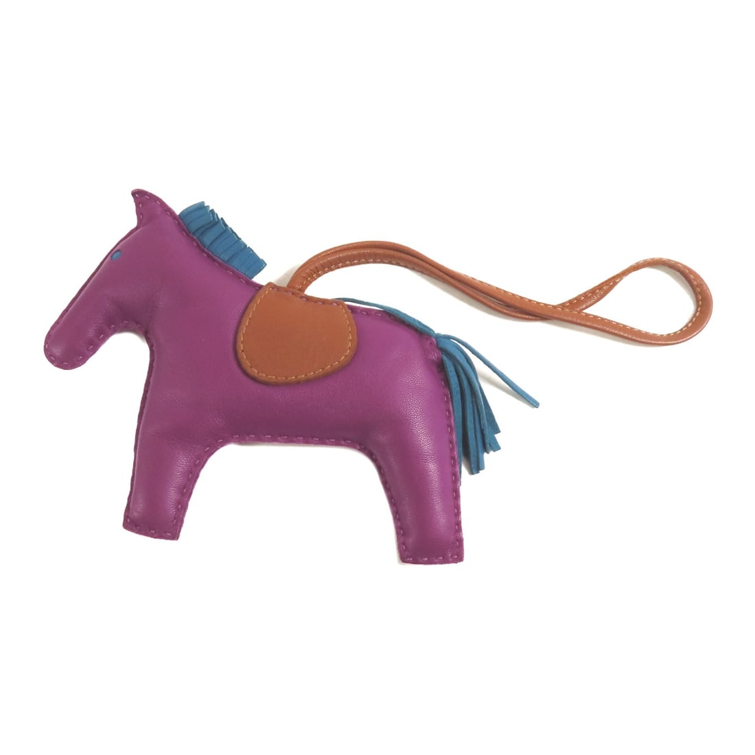 HERMES Rodeo GM Charm Anemone Purple Lambskin Leather: HERMES Rodeo GM Charm Anemone Purple Lambskin Leather This exquisite HERMES Rodeo GM Charm is crafted from premium lambskin leather, showcasing a beautiful Anemone color that adds a vibrant touch to a