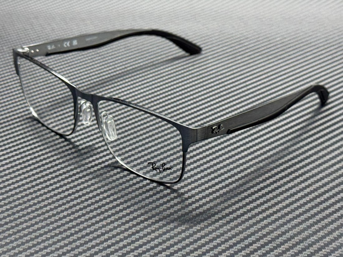 Ray-Ban RX7550 3214 Gunmetal Unisex Eyeglasses 57mm with Case: Ray-Ban RX7550 3214 Gunmetal Unisex Eyeglasses 57mm with Case Elevate your eyewear collection with these stylish Ray-Ban RX7550 3214 eyeglasses, designed for unisex wear. Featuring a sleek gunmetal fr