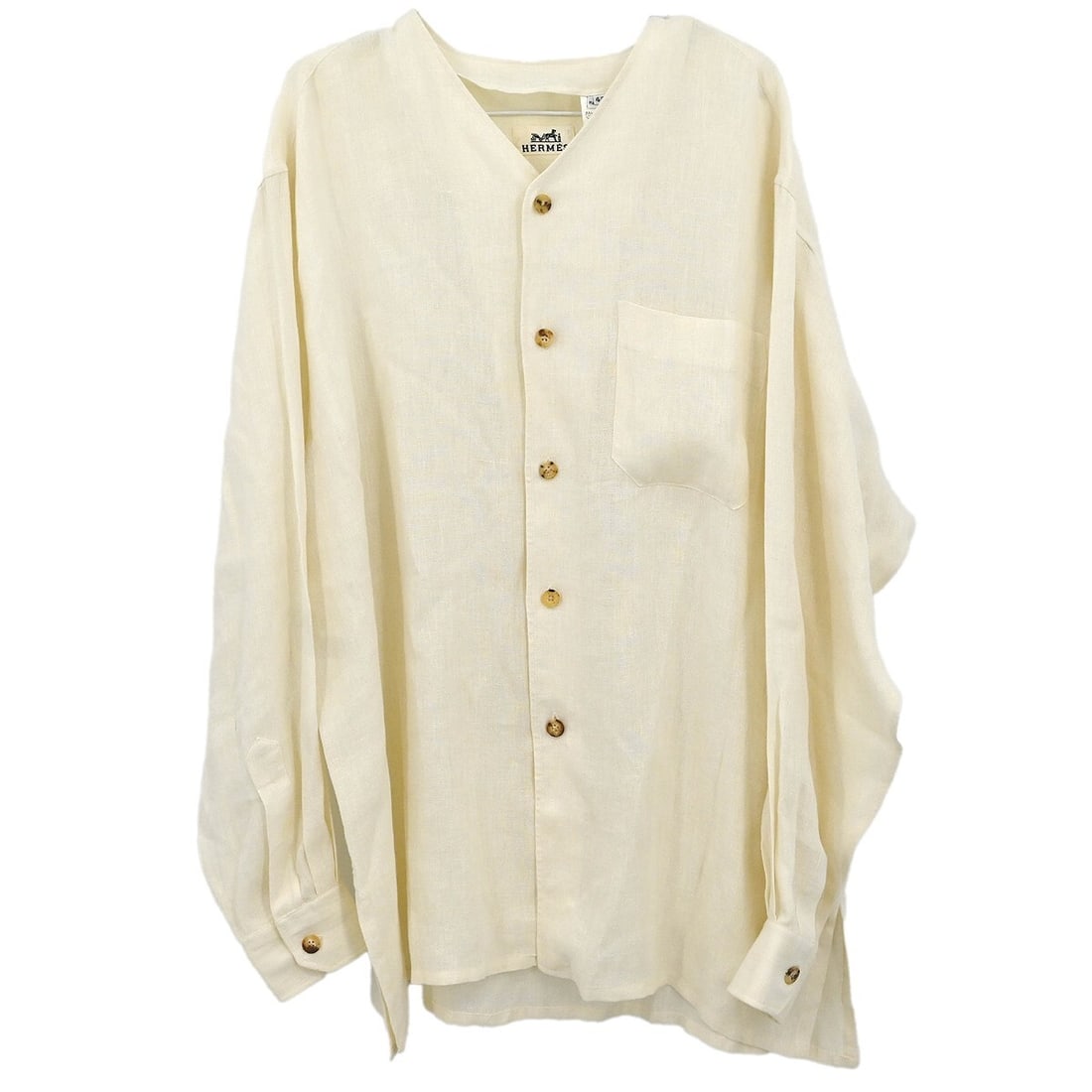 Vintage Hermes White Linen Blouse Long Sleeve #42 Casual: Vintage Hermes White Linen Blouse Long Sleeve #42 Casual Elevate your casual wardrobe with this vintage Hermes blouse in a classic white hue. Crafted from 100% linen, this long sleeve blouse is perfec