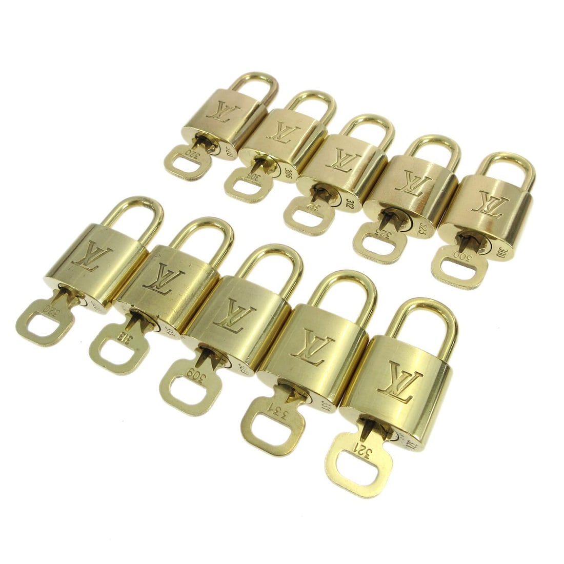 Louis Vuitton Gold-tone Padlock & Key Charm 10 Piece Set: Louis Vuitton Gold-tone Padlock & Key Charm 10 Piece Set This exquisite 10-piece set of Louis Vuitton Padlock & Key Bag Accessories is a luxurious addition to any collection. Crafted in a stunning gol
