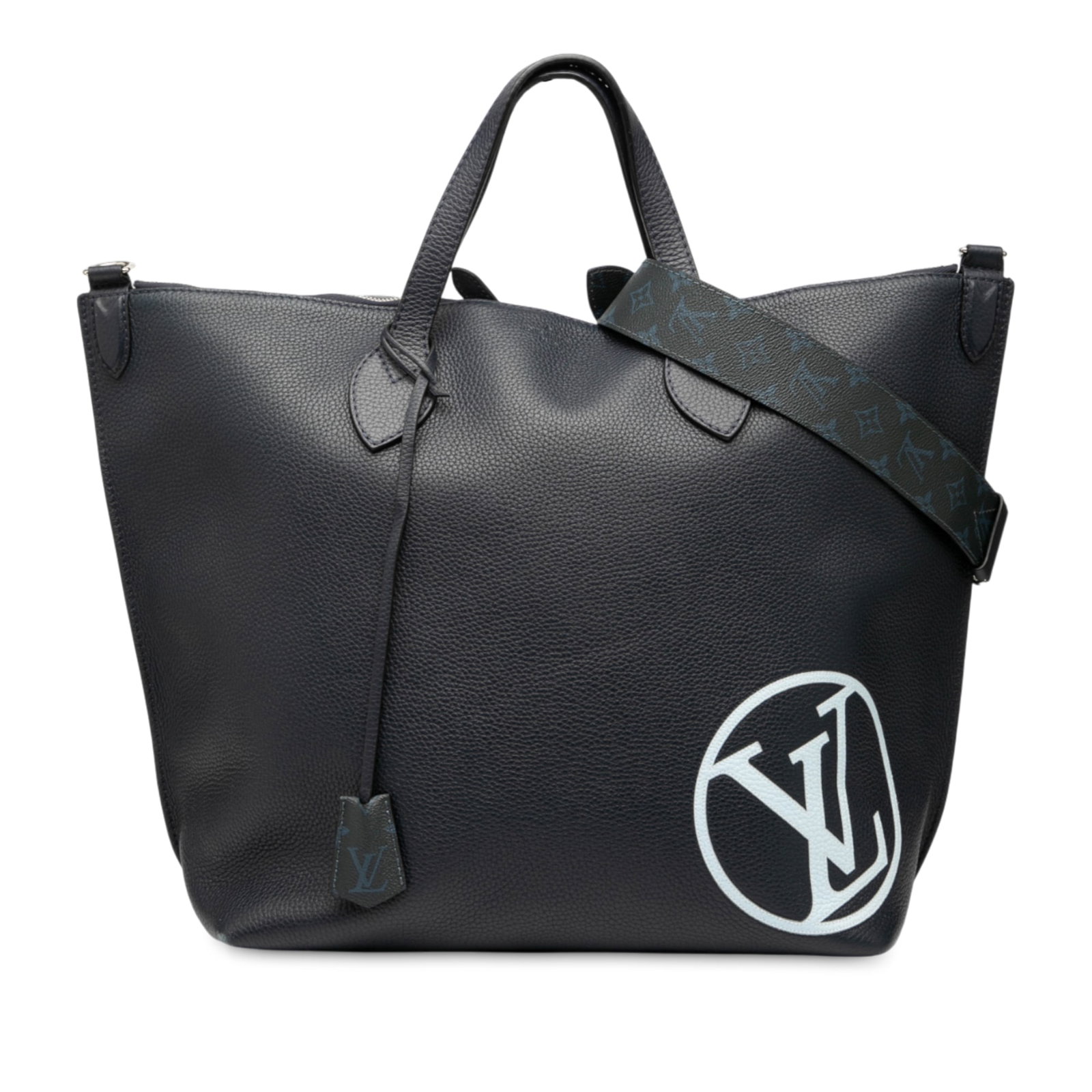 Louis Vuitton Taurillon East Side Tote GM Blue Leather: Louis Vuitton Taurillon East Side Tote GM Blue Leather The Louis Vuitton Taurillon East Side Tote GM is a stylish and practical bag crafted from premium leather. It features flat handles and a detacha