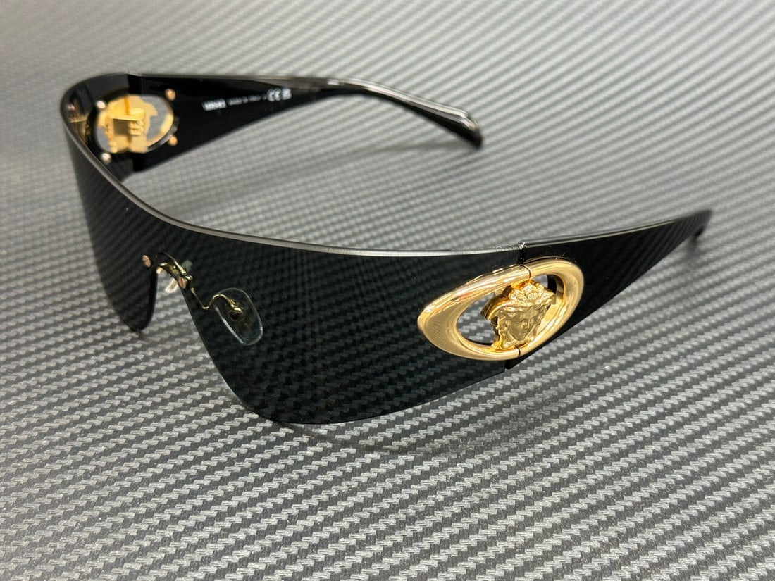 Versace VE2280 100287 Black Grey Women's Sunglasses with Authenticity Certificate: Versace VE2280 100287 Black Grey Women's Sunglasses with Authenticity Certificate Introducing the VERSACE VE2280 100287 sunglasses, a stylish accessory for women. These sunglasses feature a sophistica