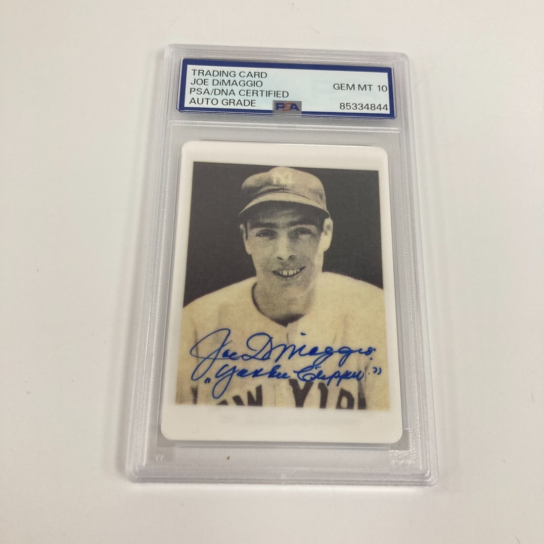 1939 Play Ball Joe DiMaggio Signed Porcelain Card PSA 10 GEM MINT: 1939 Play Ball Joe DiMaggio Signed Porcelain Card PSA 10 GEM MINT This is a stunning 1939 Play Ball Joe DiMaggio "Yankee Clipper" signed porcelain baseball card, graded PSA 10 GEM MINT. The card featu