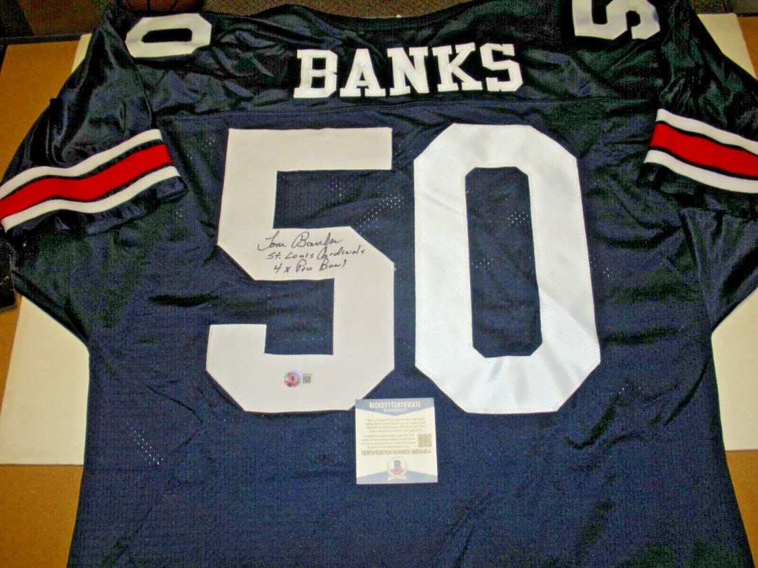 Tom Banks Signed Auburn Tigers Wilson Jersey Beckett COA: Tom Banks Signed Auburn Tigers Wilson Jersey Beckett COA Show your support for the Auburn Tigers with this officially licensed Wilson jersey, signed by TOM BANKS. This original jersey is perfect for a