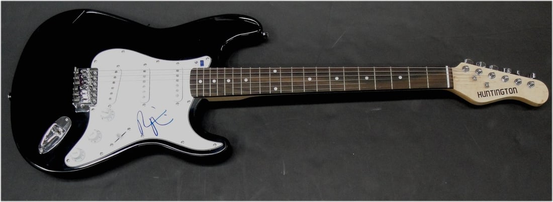 Robin Thicke Hand Signed Electric Guitar Authenticated by GAI: Robin Thicke Hand Signed Electric Guitar Authenticated by GAI This is a hand-signed electric guitar by Robin Thicke, featuring an authentic signature that has been verified by Global Authentics (GAI).