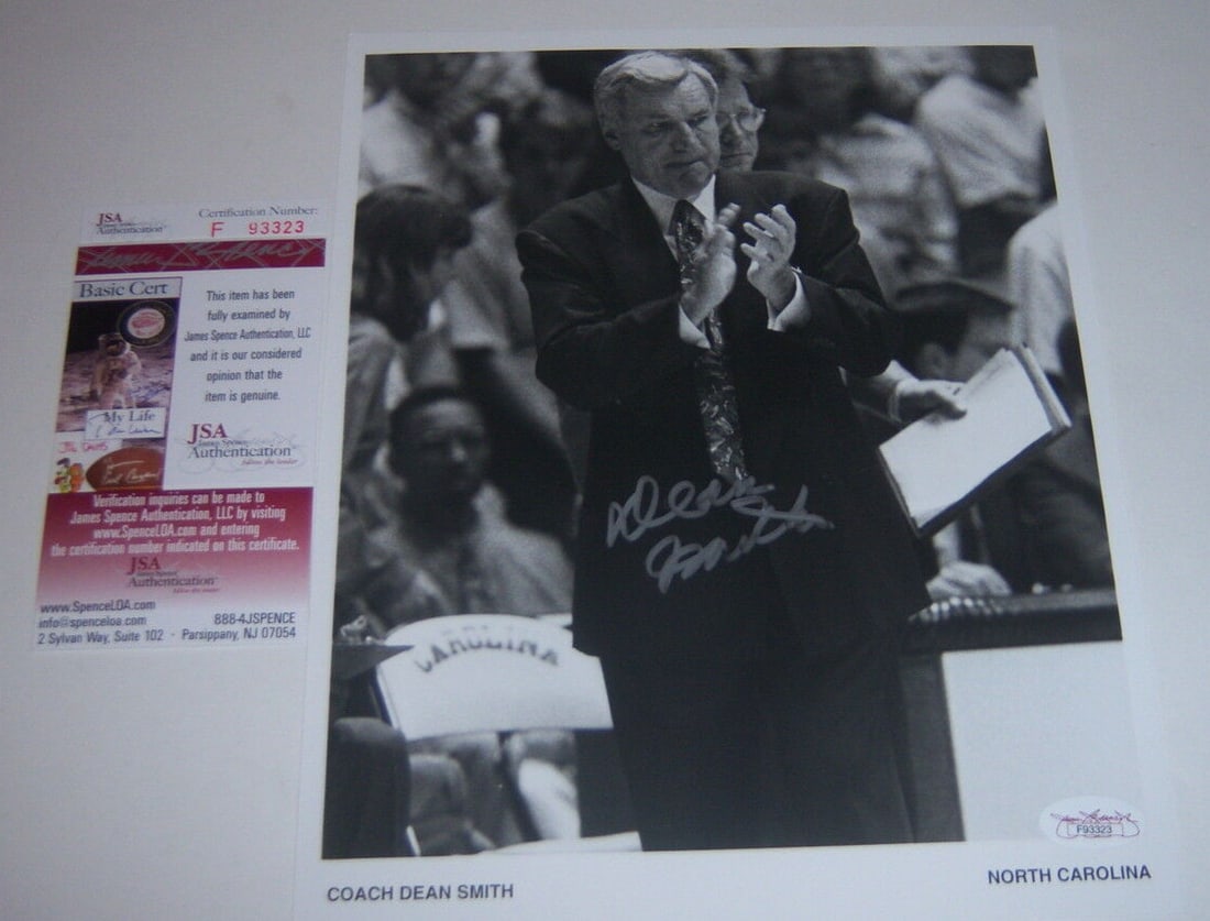 Dean Smith North Carolina Tar Heels Signed 8x10 Photo JSA/COA: Dean Smith North Carolina Tar Heels Signed 8x10 Photo JSA/COA This is an original 8x10 photo signed by Dean Smith, the legendary coach of the North Carolina Tar Heels, featuring a JSA/COA certificatio