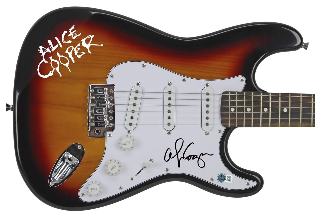 Alice Cooper Signed Tobacco Electric Guitar with Decal BAS Authenticated: Alice Cooper Signed Tobacco Electric Guitar with Decal BAS Authenticated This authentic Tobacco Electric Guitar has been personally signed by the legendary Alice Cooper. It features a decal and comes