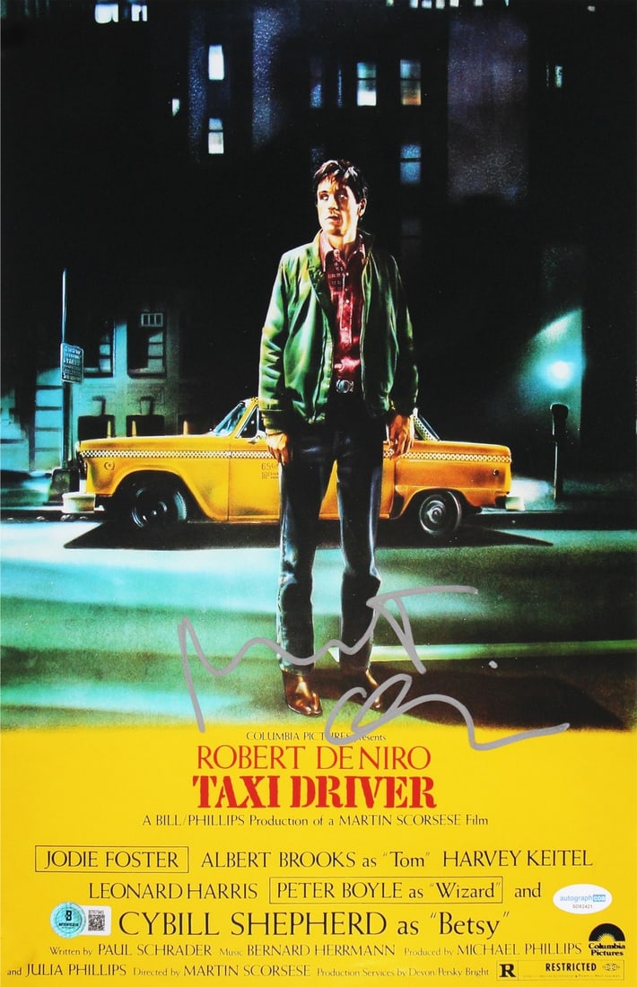 Robert De Niro Signed 11x14 Taxi Driver Photo BAS Authenticated: Robert De Niro Signed 11x14 Taxi Driver Photo BAS Authenticated This authentic 11x14 vertical photograph features the iconic character Travis Bickle, performed by Robert De Niro in the classic film "T