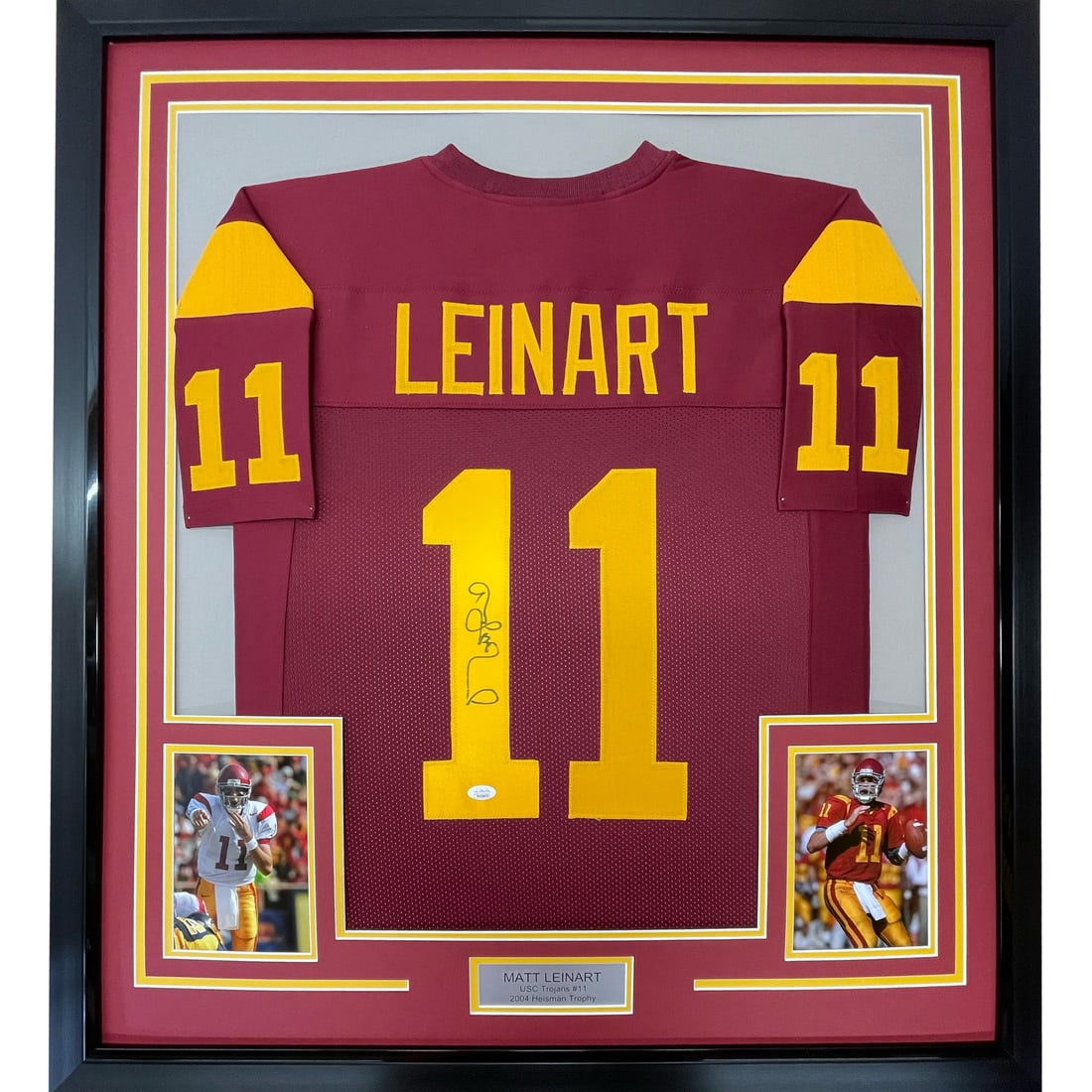 Matt Leinart Autographed Framed USC Trojans Jersey JSA COA 33x42: Matt Leinart Autographed Framed USC Trojans Jersey JSA COA 33x42 Celebrate the legacy of Matt Leinart with this framed autographed USC Trojans jersey. This authentic red jersey showcases Leinart's sig
