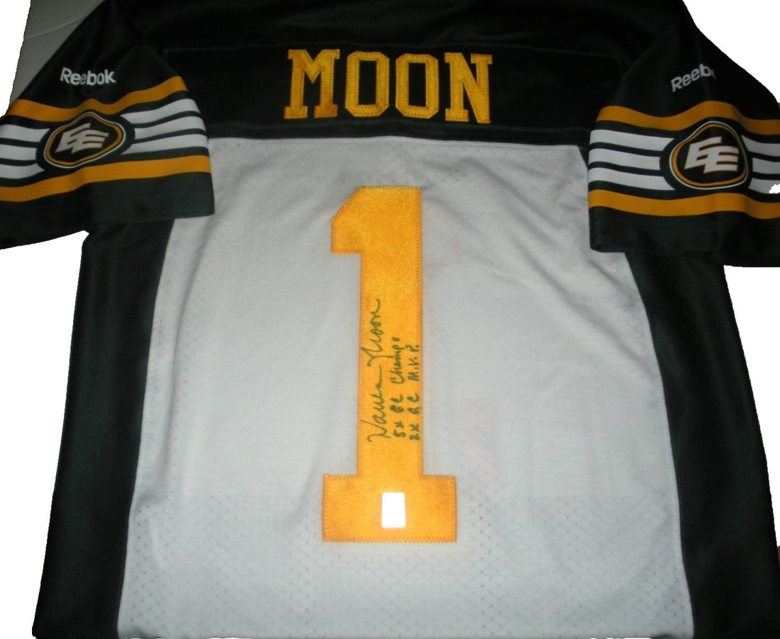 Warren Moon Edmonton Eskimos Signed Reebok Jersey with COA: Warren Moon Edmonton Eskimos Signed Reebok Jersey with COA Showcase your support for the Edmonton Eskimos with this officially licensed Reebok jersey signed by legendary quarterback Warren Moon. This