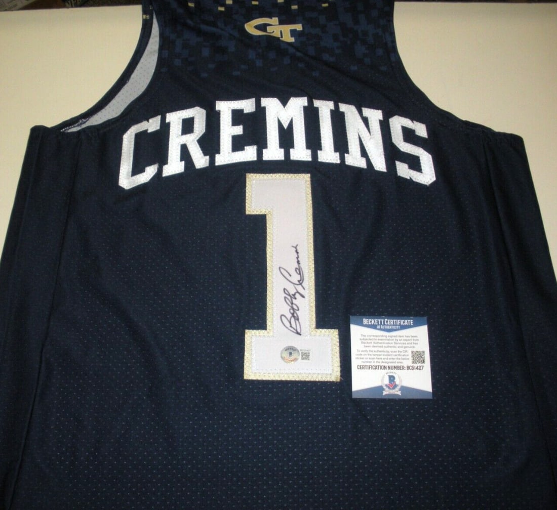 Bobby Cremins Signed Georgia Tech Russell Jersey with COA: Bobby Cremins Signed Georgia Tech Russell Jersey with COA This officially licensed Russell jersey is a unique collectible signed by Bobby Cremins, the former head coach of the Georgia Tech basketball