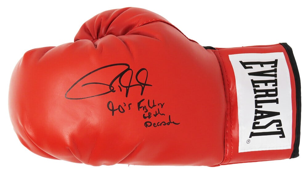 Roy Jones Jr Signed Everlast Boxing Glove with Inscription: Roy Jones Jr Signed Everlast Boxing Glove with Inscription This original Everlast red boxing glove is signed by Roy Jones Jr., an iconic figure in boxing history, renowned for being named the '90s Fig